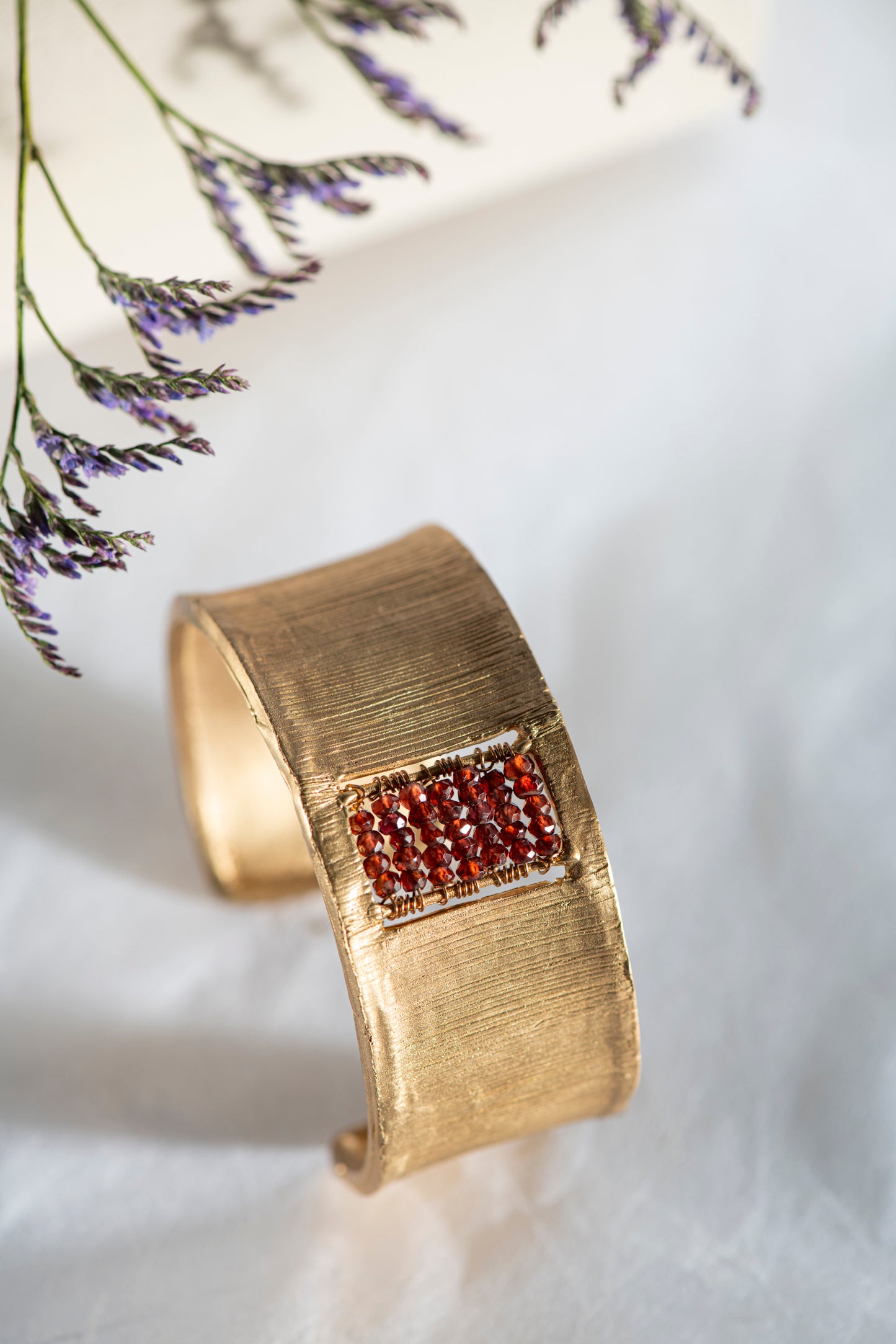 HIGH KILIM BRACELET with garnets
