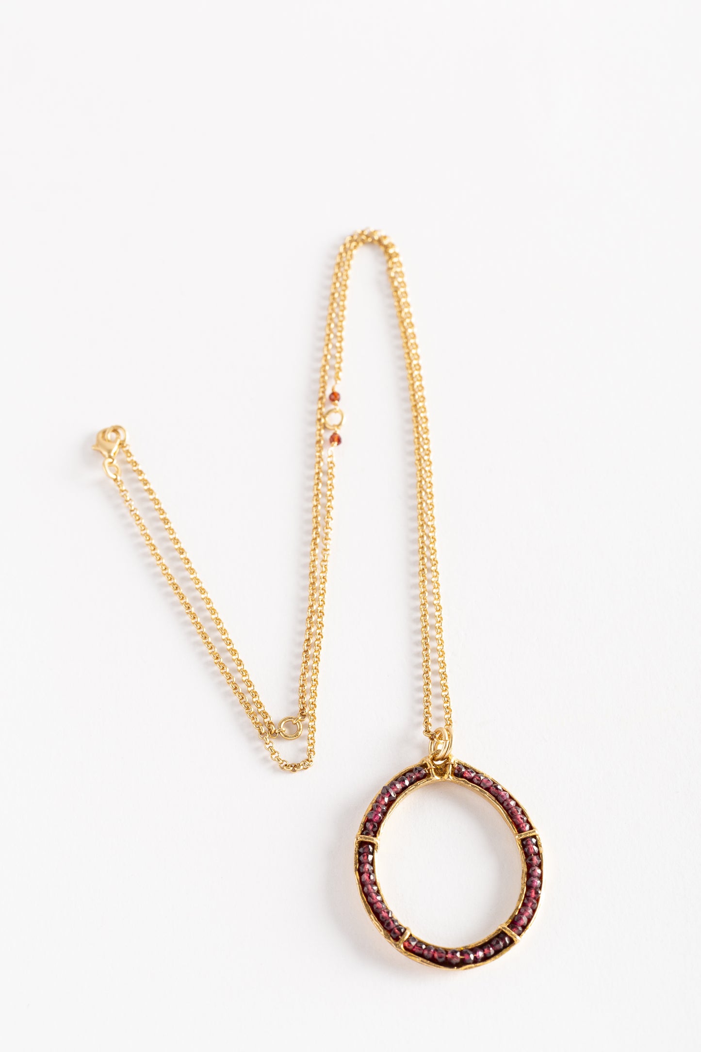 CIRCLE OF LIFE PENDANT with garnets