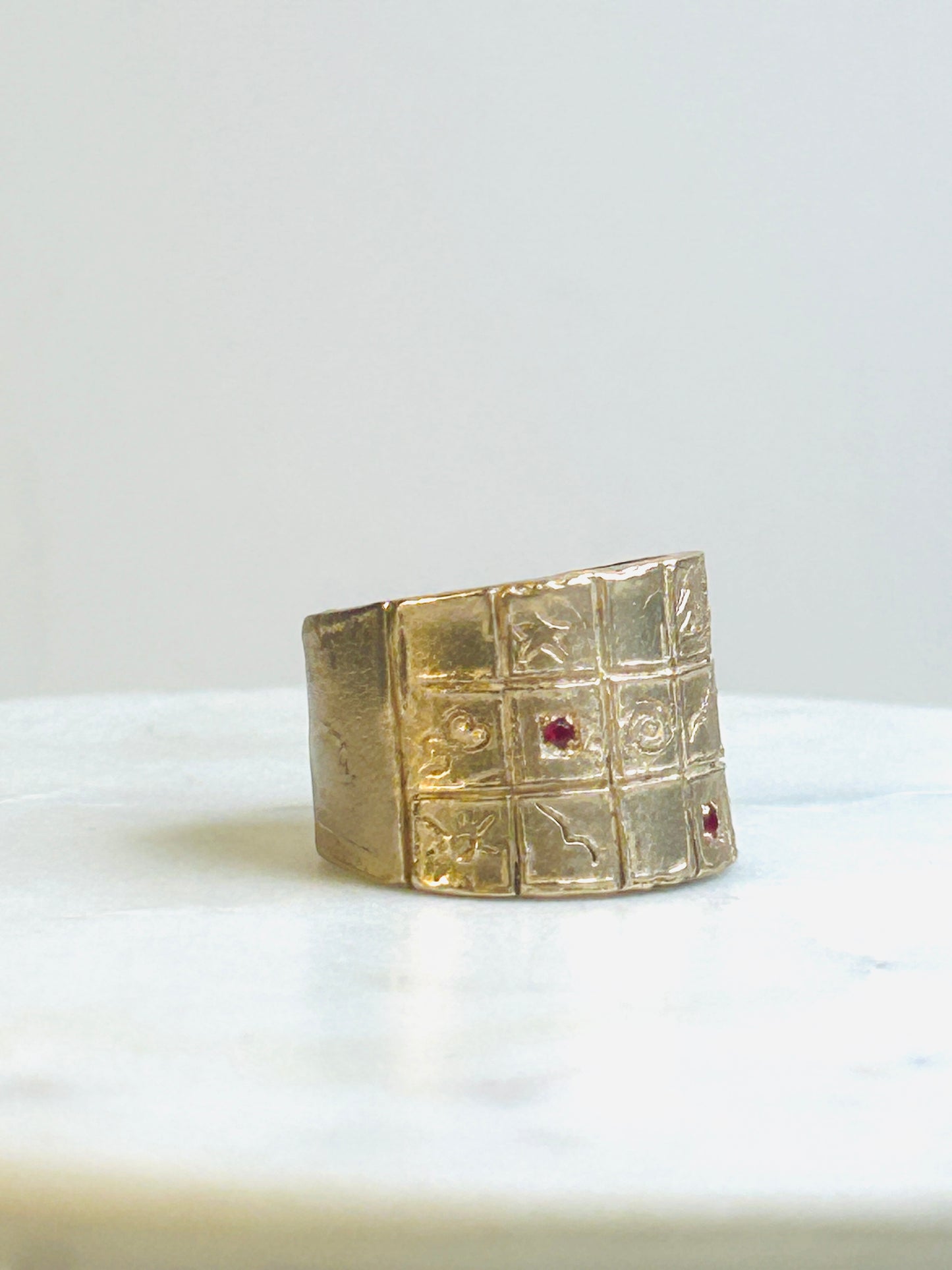 ANELLO SYMBOL BRONZO_ RUBINI