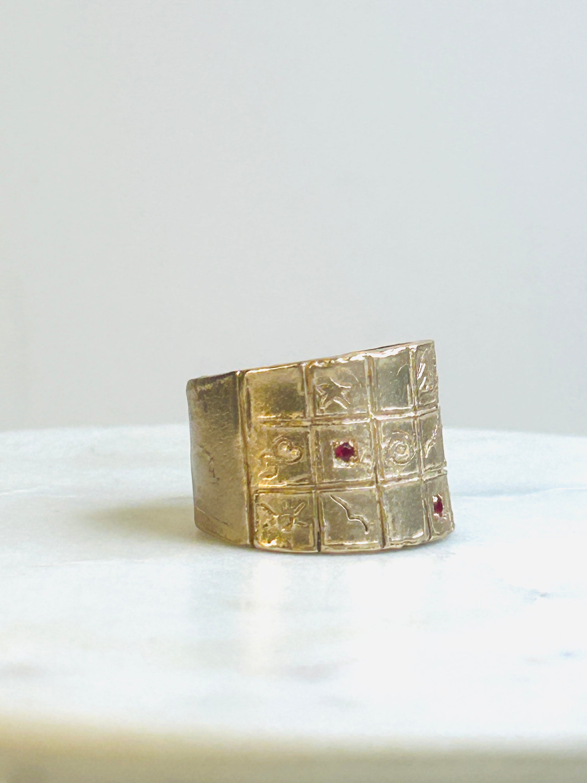 ANELLO SYMBOL BRONZO_ RUBINI