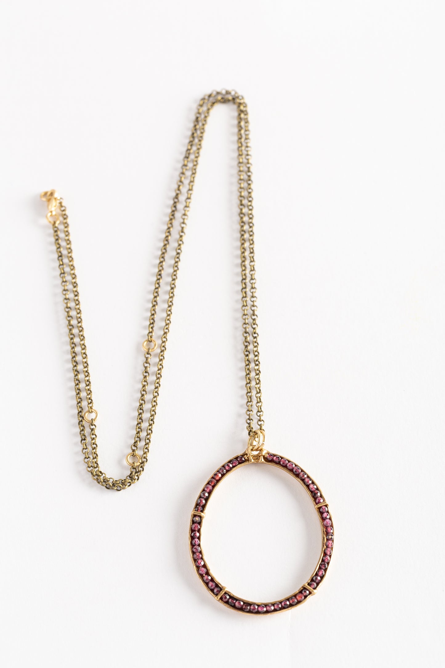 CIRCLE OF LIFE PENDANT with garnets